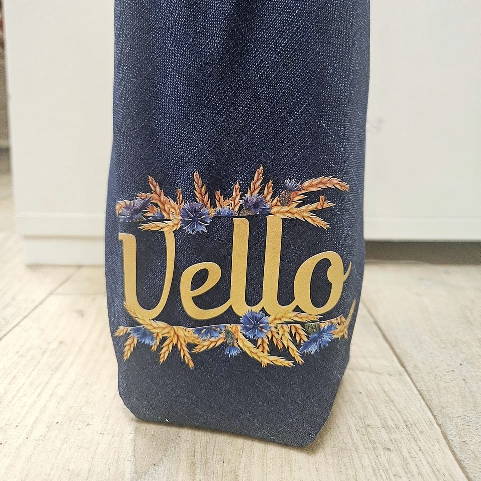Pullopussi painetulla nimellä